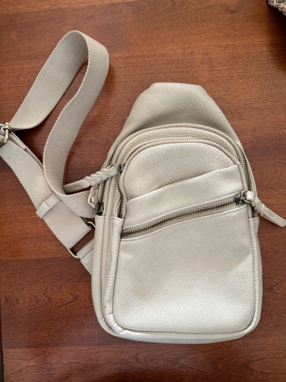Woman’s Cream Crossbody Sling Bag